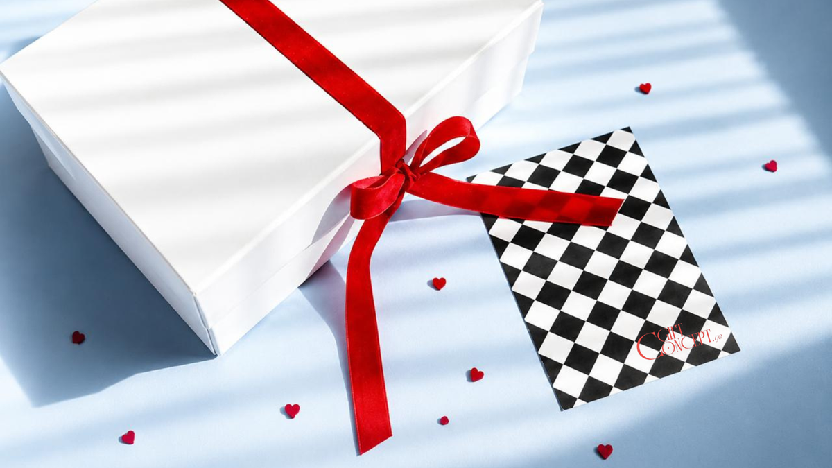 Premium white gift box with red satin ribbon and GiftConcept.ge branded card — luxury online gift boutique in Tbilisi, Georgia.